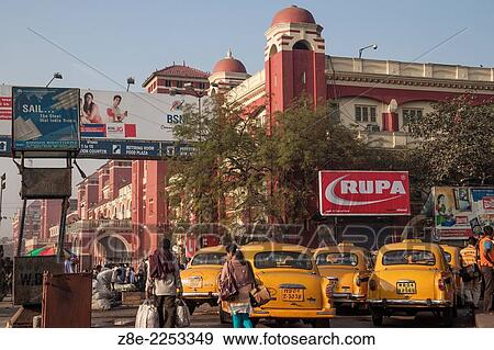 Yellow taxis at Howrah railway station in Kolkata (Calcutta), West Bengal, India. View Large Photo Image Stock Photo - Yellow taxis at Howrah railway station in Kolkata (Calcutta), West Bengal, India.. Fotosearch