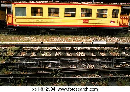 Picture - Yellow train, Villefranche-de-Conflent. Pyrenees-Orientales, Languedoc-Roussillon, France. Fotosearch