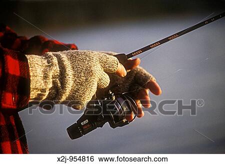 Yellowstone National Park, Wyoming - A fisherman on a chilly morning on the shore of Heart Lake View Large Photo Image Stock Photograph - Yellowstone National Park, Wyoming - A fisherman on a chilly morning on the shore of Heart Lake. Fotosearch