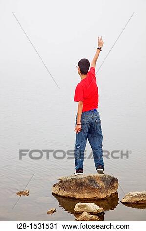 Yes I win. A teen making a victory sign View Large Photo Image Stock Image - Yes I win. A teen making a victory sign. Fotosearch