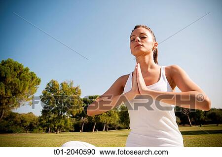 yoga girl in a park. View Large Photo Image Stock Image - yoga girl in a park.. Fotosearch