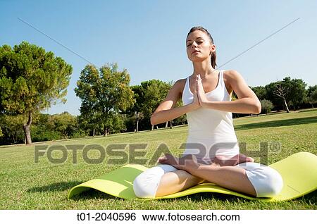 yoga girl in a park. View Large Photo Image Stock Photograph - yoga girl in a park.. Fotosearch