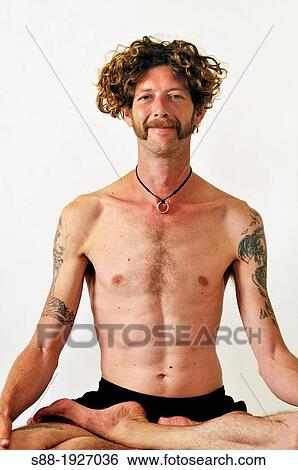 Yoga master with Tattoo View Large Photo Image Stock Photograph - Yoga master with Tattoo. Fotosearch