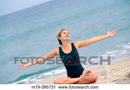 yoga on the beach View Large Photo Image Stock Image - yoga on the beach. Fotosearch
