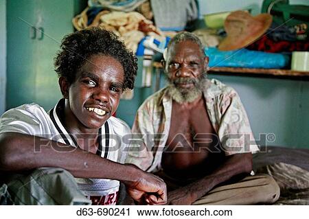 Young aborigine man visiting his elders in Aborige community of Wugularr (aka Beswick), Arnhem Land, Northern Territory, Australia View Large Photo Image Stock Image - Young aborigine man visiting his elders in Aborige community of Wugularr (aka Beswick), Arnhem Land, Northern Territory, Australia. Fotosearch
