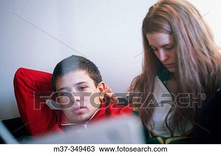 Young adults in front of TV. View Large Photo Image Stock Image - Young adults in front of TV.. Fotosearch