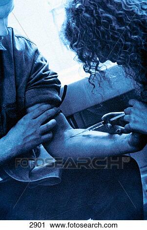 Young adults shooting up heroin View Large Photo Image Stock Image - Young adults shooting up heroin. Fotosearch