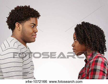 Stock Photograph - Young African-American couple facing off? Katharine Andriotis. Fotosearch