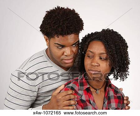 Young African-American couple in disagreement? Katharine Andriotis View Large Photo Image Stock Photography - Young African-American couple in disagreement? Katharine Andriotis. Fotosearch