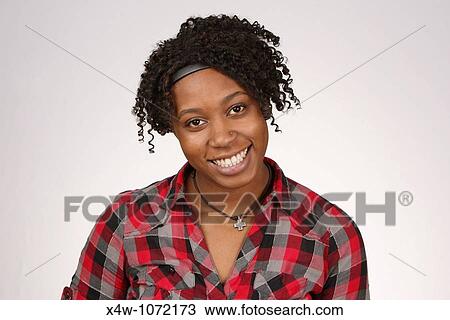 Young African-American woman posing for portrait View Large Photo Image Stock Image - Young African-American woman posing for portrait. Fotosearch