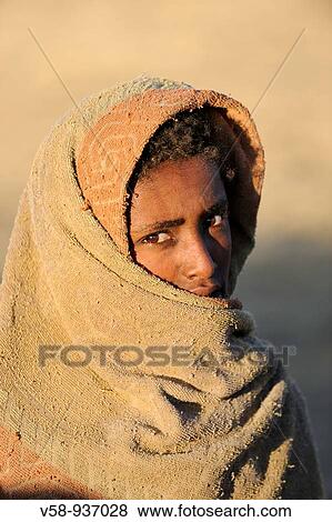 Stock Photo - Young Amhara farmer. Geech village. Simien Mountains National Park. Ethiopia.. Fotosearch