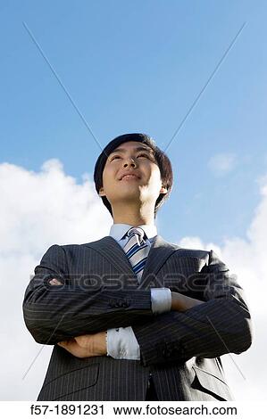 Stock Image - Young Asian businessman. Fotosearch