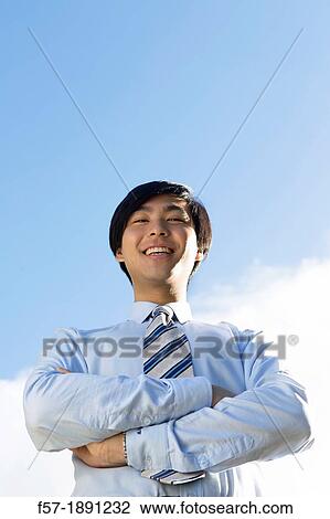 Young Asian businessman View Large Photo Image Stock Image - Young Asian businessman. Fotosearch