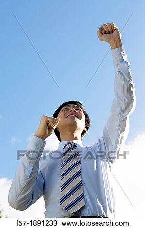 Stock Image - Young Asian businessman. Fotosearch