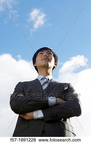 Young Asian businessman View Large Photo Image Stock Photo - Young Asian businessman. Fotosearch