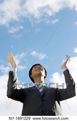 Young Asian businessman View Large Photo Image Stock Photo - Young Asian businessman. Fotosearch
