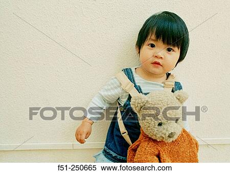 Young asian girl View Large Photo Image Stock Photography - Young asian girl. Fotosearch