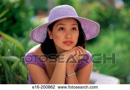 Stock Image - young Asian lady. Fotosearch