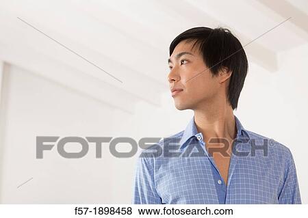 Young Asian student View Large Photo Image Stock Photo - Young Asian student. Fotosearch