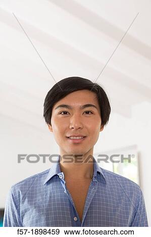 Young Asian student View Large Photo Image Stock Photo - Young Asian student. Fotosearch