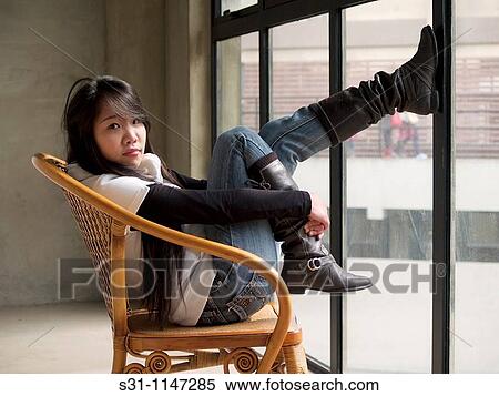 Stock Photography - Young asian woman posing. Fotosearch