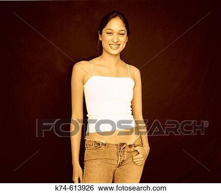 young asian woman smiling at viewer View Large Photo Image Stock Photograph - young asian woman smiling at viewer. Fotosearch