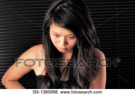 Young asian woman View Large Photo Image Stock Photo - Young asian woman. Fotosearch