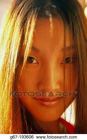 Young asiatic woman View Large Photo Image Stock Photograph - Young asiatic woman. Fotosearch
