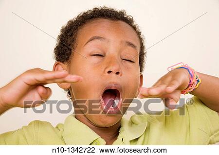 Young black boy View Large Photo Image Stock Image - Young black boy. Fotosearch