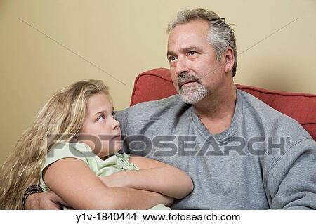 Picture - Young blonde girl and her father. Fotosearch