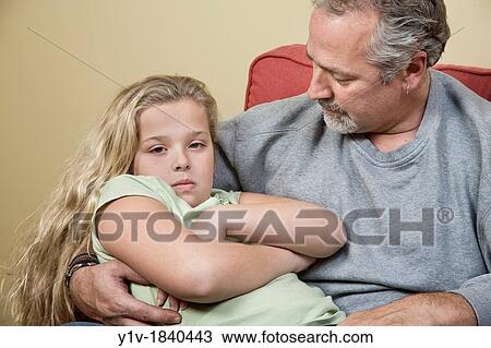Young blonde girl and her father View Large Photo Image Stock Image - Young blonde girl and her father. Fotosearch