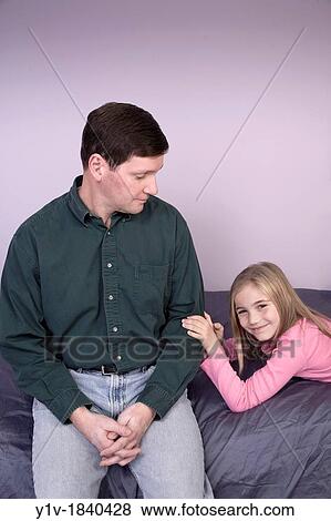 Young blonde girl with her father View Large Photo Image Stock Photo - Young blonde girl with her father. Fotosearch