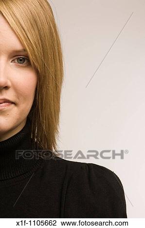 young blonde haired woman in studio View Large Photo Image Stock Image - young blonde haired woman in studio. Fotosearch
