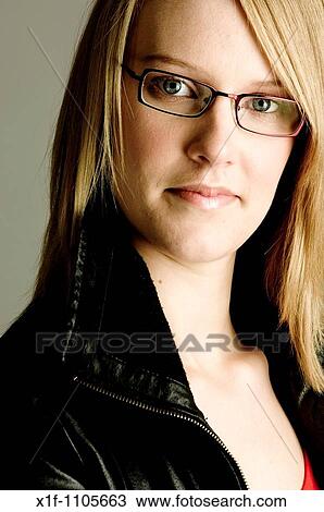 young blonde haired woman in studio View Large Photo Image Stock Image - young blonde haired woman in studio. Fotosearch