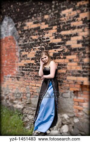 Stock Image - young blonde woman posing. Fotosearch