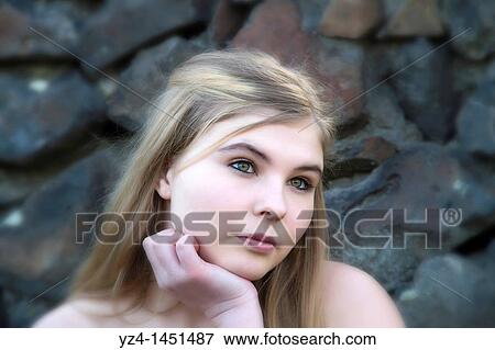 Stock Photo - young blonde woman posing. Fotosearch