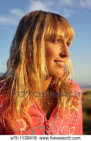Stock Photo - Young blonde woman. Fotosearch