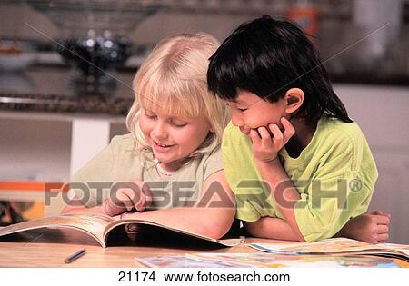 Young boy and girl doing homework View Large Photo Image Picture - Young boy and girl doing homework. Fotosearch