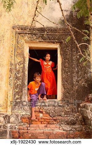 Young Boy and girl Playing near Temple in Bagan, Myanmar, Burma View Large Photo Image Stock Image - Young Boy and girl Playing near Temple in Bagan, Myanmar, Burma. Fotosearch