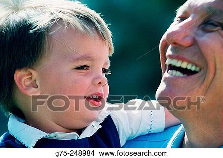 Young boy and grandfather View Large Photo Image Picture - Young boy and grandfather. Fotosearch