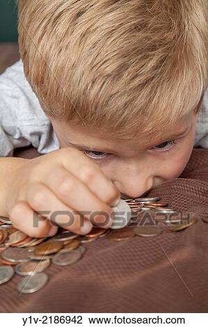Young boy counting American money. View Large Photo Image Stock Image - Young boy counting American money.. Fotosearch
