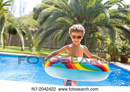 Young boy enjoys summer. View Large Photo Image Stock Image - Young boy enjoys summer.. Fotosearch