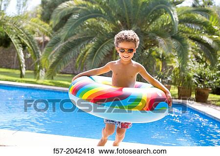 Young boy enjoys summer. View Large Photo Image Stock Photo - Young boy enjoys summer.. Fotosearch