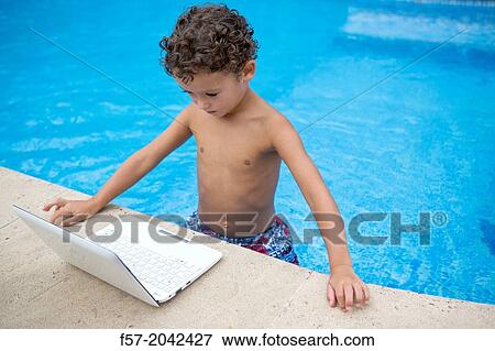 Young boy enjoys summer. View Large Photo Image Stock Photo - Young boy enjoys summer.. Fotosearch
