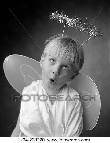 Young Boy In Angel Costume Making A Silly Face View Large Photo Image Stock Image - Young Boy In Angel Costume Making A Silly Face. Fotosearch