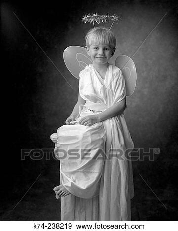 Young Boy In Angel Costume View Large Photo Image Stock Photo - Young Boy In Angel Costume. Fotosearch