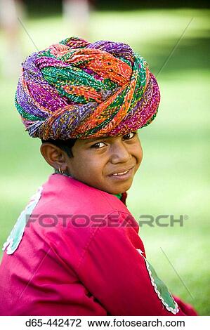 Stock Image - Young Boy in Rajasthani clothes. Jaipur. Rajasthan. India.. Fotosearch