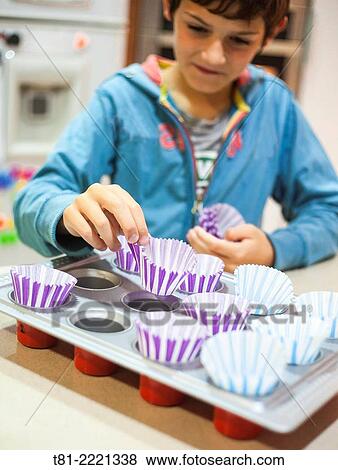 Young boy learning to cook, in the kitchen Valencia, Spain,. View Large Photo Image Stock Photo - Young boy learning to cook, in the kitchen Valencia, Spain,.. Fotosearch