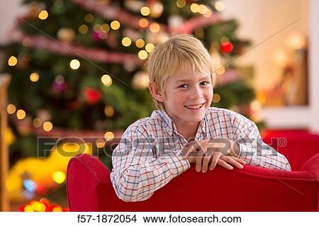 Picture - Young boy looking forward for Christmas. Fotosearch