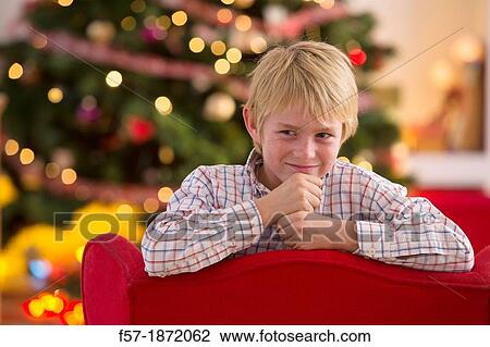 Young boy looking forward for Christmas View Large Photo Image Stock Image - Young boy looking forward for Christmas. Fotosearch
